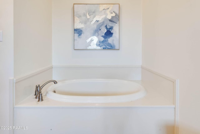 bathroom featuring a garden tub