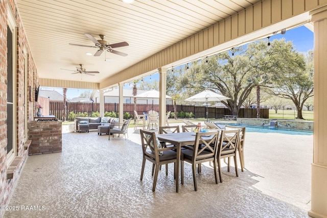 view of patio / terrace with outdoor dining space, a fenced in pool, a fenced backyard, ceiling fan, and outdoor lounge area