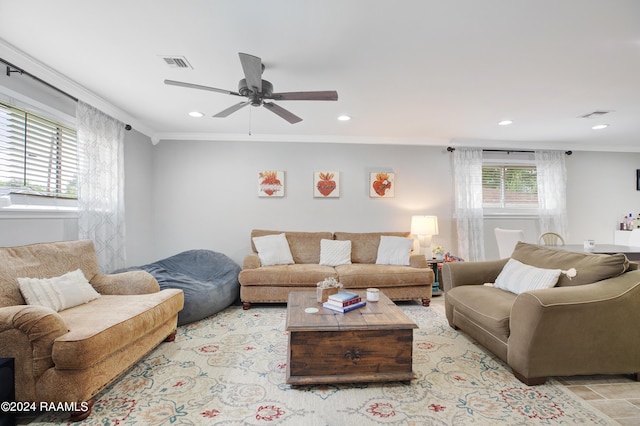 living area with visible vents, recessed lighting, a ceiling fan, and ornamental molding