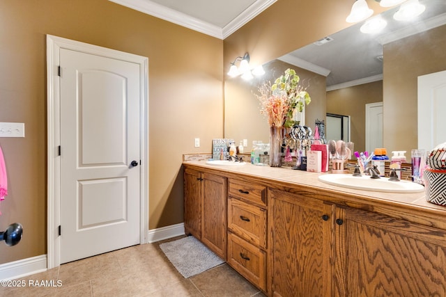 bathroom featuring tile patterned flooring, crown molding, and a sink