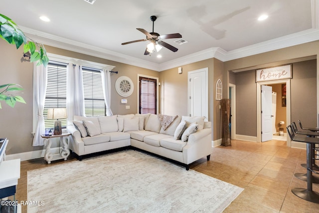 living room with light tile patterned floors, visible vents, crown molding, and baseboards