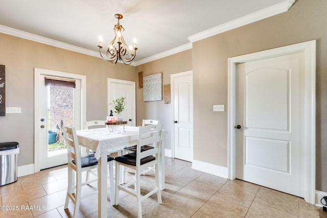 dining area with light tile patterned floors, a notable chandelier, baseboards, and ornamental molding