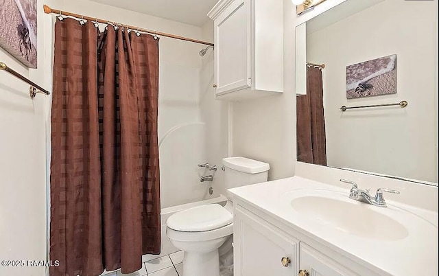 full bath with vanity, tile patterned floors, toilet, and shower / bath combo