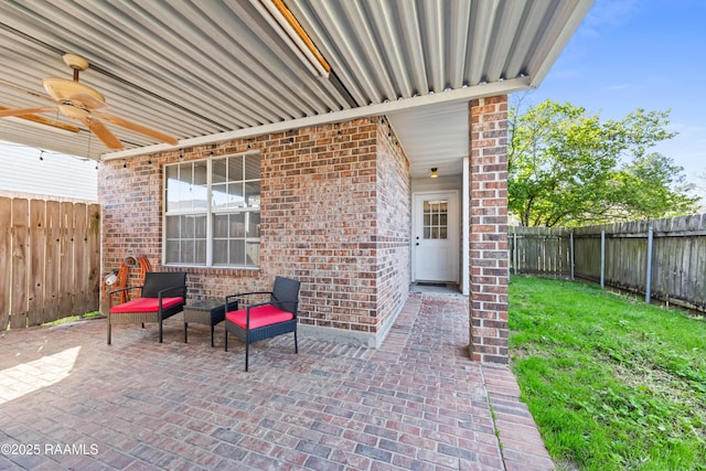 view of patio / terrace featuring a ceiling fan and a fenced backyard