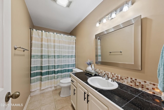 bathroom featuring vanity, visible vents, tile patterned floors, toilet, and backsplash