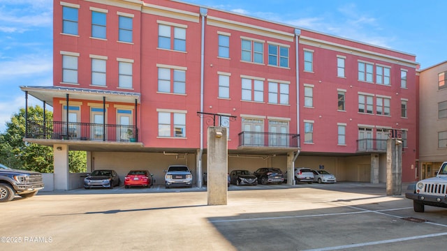 view of property with covered parking