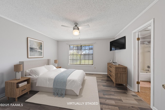 bedroom with a textured ceiling, wood finished floors, baseboards, and ornamental molding