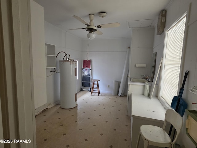 bathroom with water heater, tile patterned floors, ceiling fan, and a sink