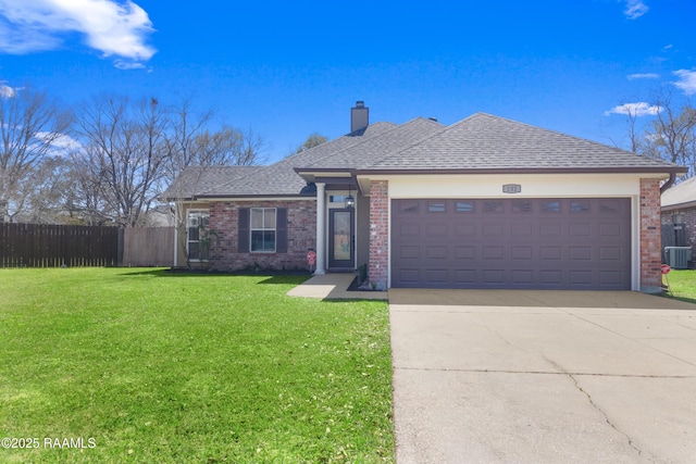 single story home with fence, concrete driveway, an attached garage, a front yard, and a chimney