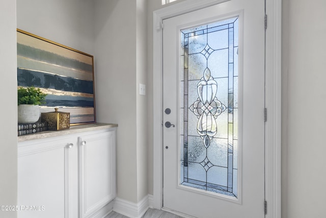 entrance foyer with baseboards