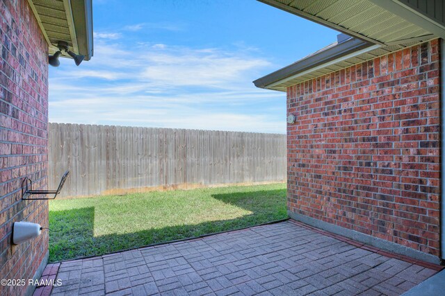 view of patio / terrace with fence