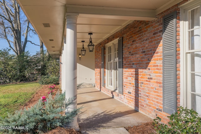 view of patio featuring a porch and visible vents