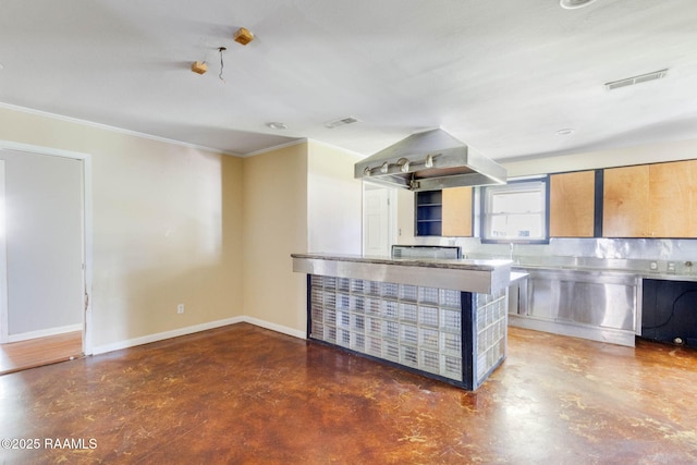 kitchen featuring stainless steel countertops, baseboards, visible vents, and concrete floors