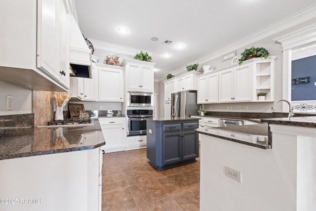 kitchen with white cabinetry, open shelves, crown molding, and appliances with stainless steel finishes