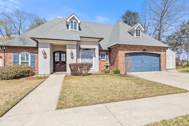 view of front of home with french doors, brick siding, and a shingled roof