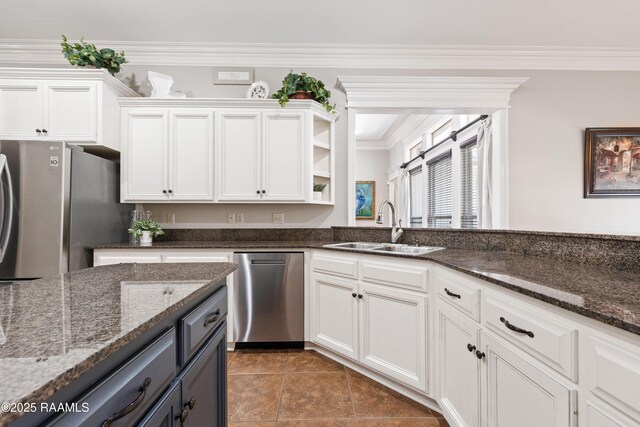 kitchen featuring a sink, crown molding, appliances with stainless steel finishes, white cabinets, and open shelves