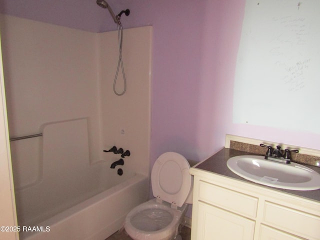 bathroom featuring vanity, toilet, and tub / shower combination