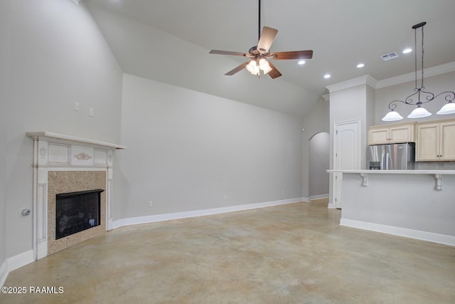 unfurnished living room featuring a ceiling fan, finished concrete flooring, recessed lighting, a fireplace, and baseboards