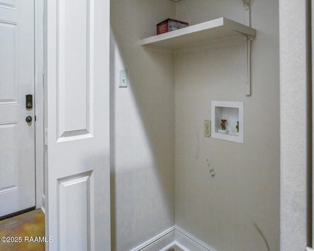 laundry area with hookup for a washing machine, baseboards, and laundry area