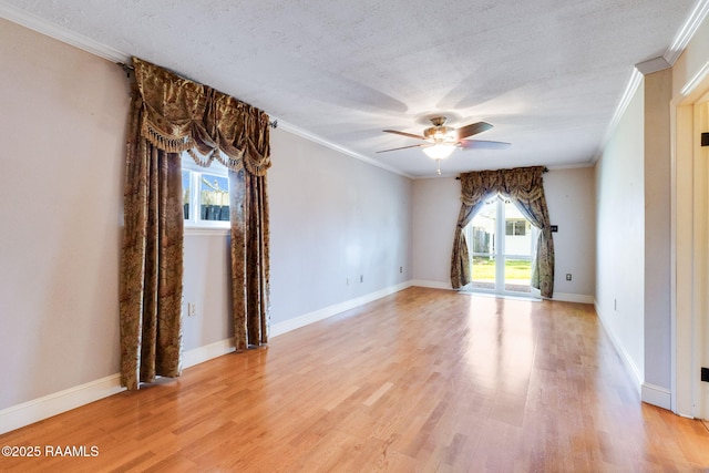 unfurnished room featuring ceiling fan, a textured ceiling, light wood-style floors, and ornamental molding