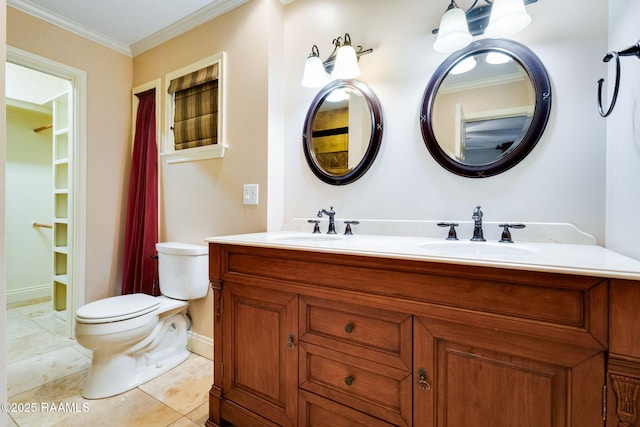 full bath with toilet, a sink, crown molding, tile patterned flooring, and double vanity