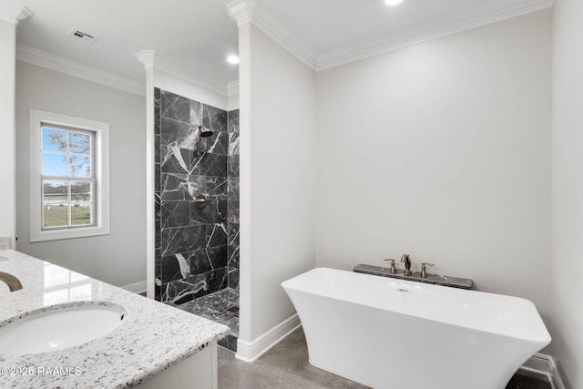 bathroom with vanity, baseboards, visible vents, tiled shower, and a freestanding bath