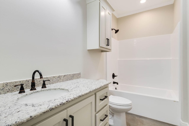 bathroom with recessed lighting, toilet, vanity, and shower / tub combination