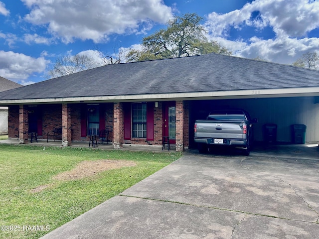 ranch-style house with driveway, a front lawn, covered porch, a shingled roof, and brick siding