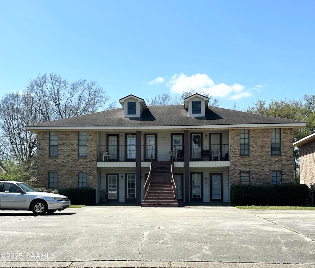 view of building exterior featuring stairway