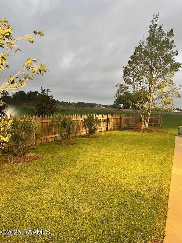 view of yard with fence