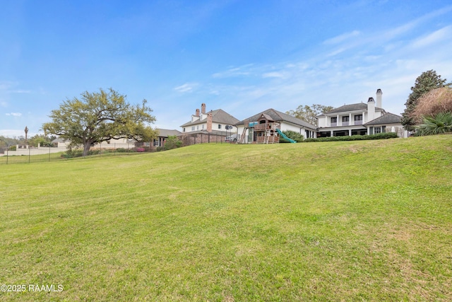 306 Princeton Woods Loop, Lafayette, LA 70508 - view of yard featuring fence and a playground