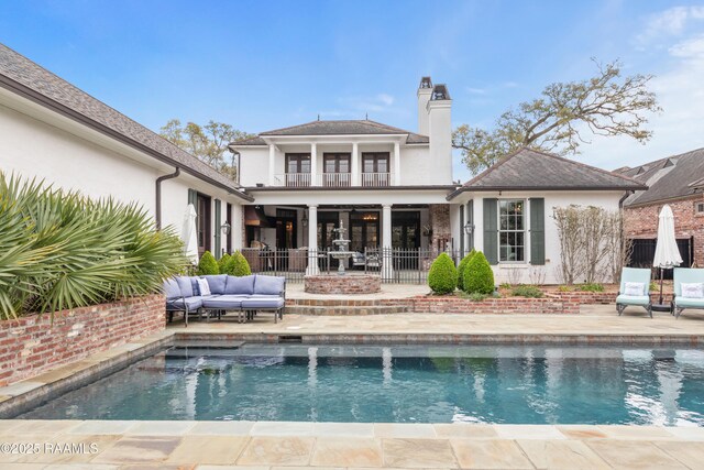 306 Princeton Woods Loop, Lafayette, LA 70508 - rear view of property with an outdoor living space, fence, a balcony, a chimney, and a patio area