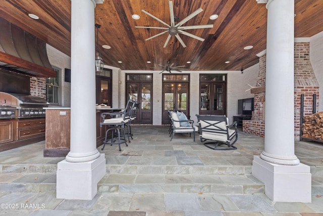 306 Princeton Woods Loop, Lafayette, LA 70508 - view of patio with a ceiling fan, outdoor wet bar, area for grilling, and french doors