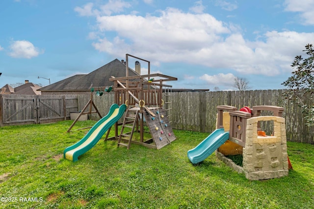 view of play area featuring a fenced backyard and a yard