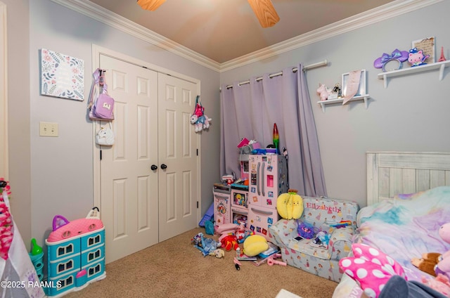 carpeted bedroom featuring a closet, a ceiling fan, and ornamental molding