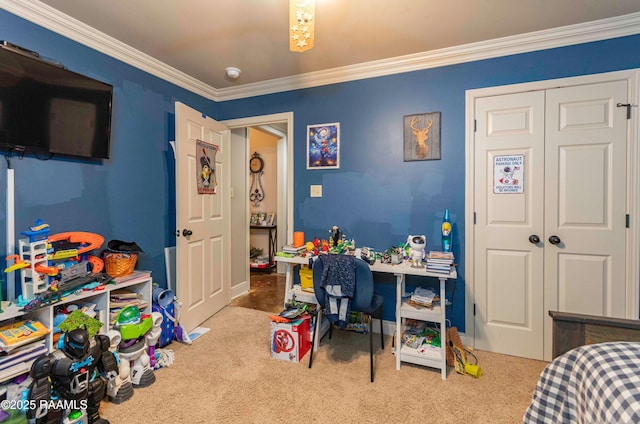 bedroom featuring a closet, crown molding, and carpet floors