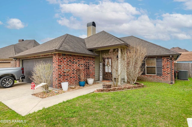 single story home featuring a front yard, cooling unit, an attached garage, concrete driveway, and brick siding