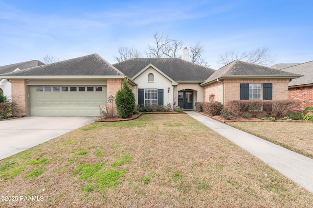 ranch-style home with concrete driveway, brick siding, a front yard, and a shingled roof