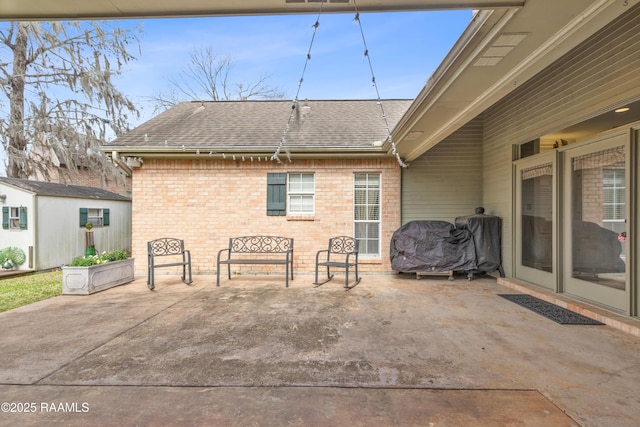 view of patio / terrace featuring an outdoor structure