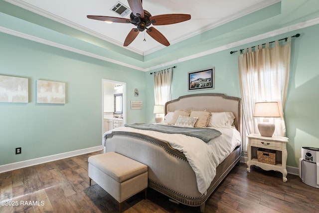 bedroom featuring visible vents, connected bathroom, crown molding, baseboards, and dark wood-style flooring