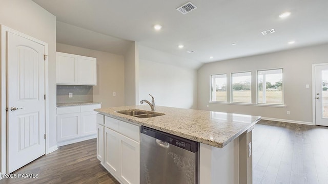 kitchen with a sink, visible vents, dark wood-type flooring, and dishwasher