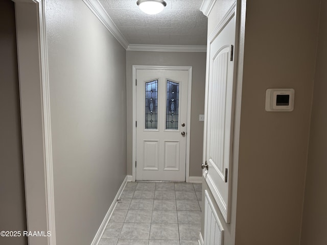 doorway to outside with light tile patterned flooring, visible vents, baseboards, and ornamental molding