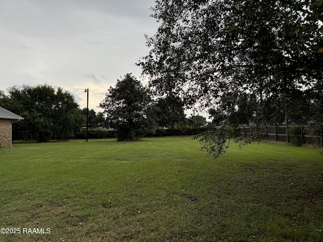 view of yard featuring fence