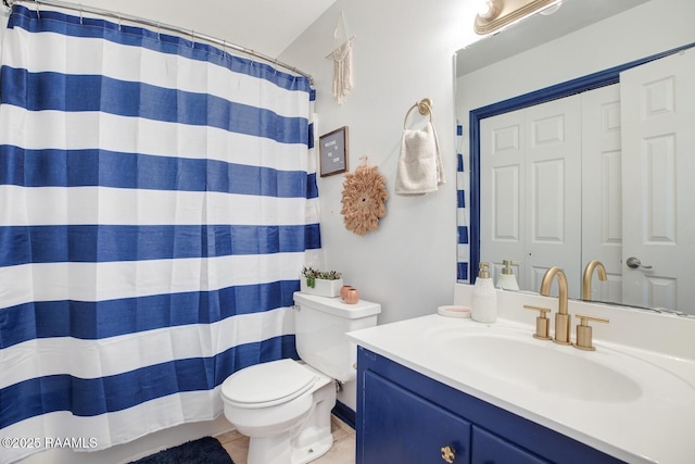 full bath featuring vanity, tile patterned floors, curtained shower, and toilet