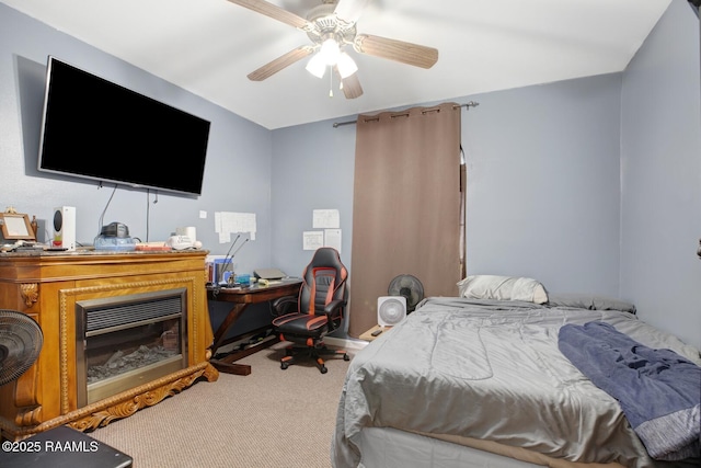 carpeted bedroom with a ceiling fan