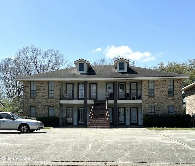 view of property with stairway