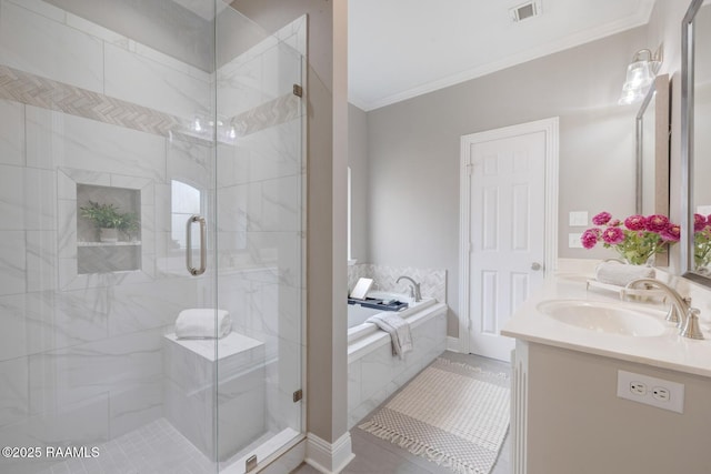 full bath featuring visible vents, a garden tub, a stall shower, crown molding, and vanity