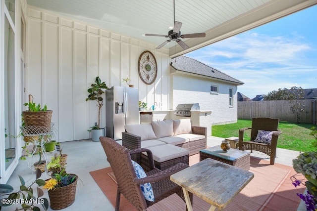 view of patio / terrace featuring fence, an outdoor living space, area for grilling, ceiling fan, and a grill