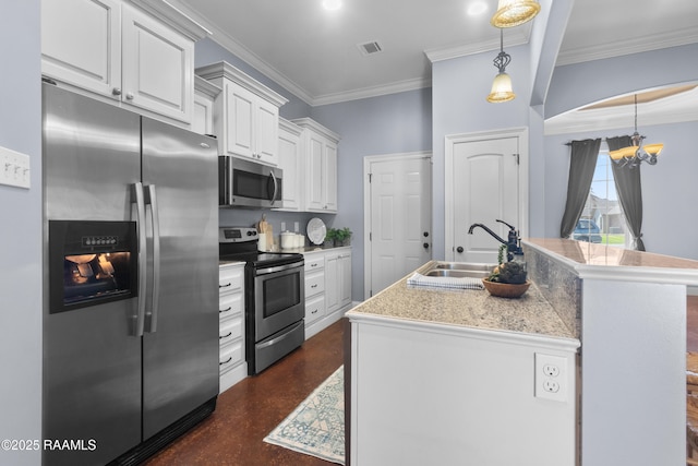 kitchen featuring visible vents, an inviting chandelier, a sink, white cabinets, and appliances with stainless steel finishes