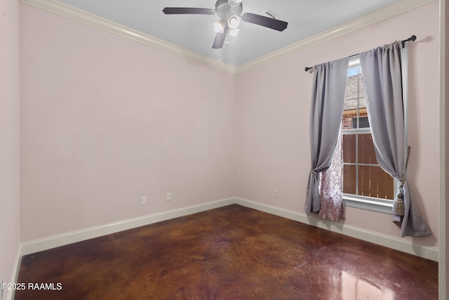 spare room with finished concrete floors, a ceiling fan, baseboards, and ornamental molding